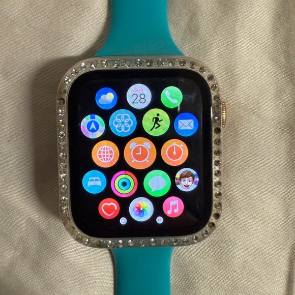 Apple Smartwatch with Teal Band and Silver Bezel